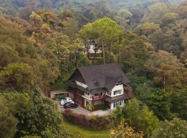 Nature Valley Farmhouse Resort by Raarees, Munnar #lap of nature #premium rooms #parking #Scenic view #garden with fireplace #property of the year, Hotel in Munnar
