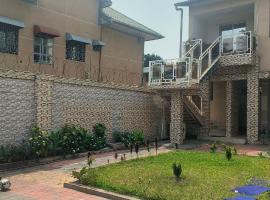 Serene 5-Bedroom Apartment in Kinshasas 10me Rue Limete-Rsidentiel, hotel sa Lemba-Gaba