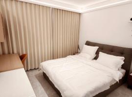 Yiwu Hetian Xungu Homestay, hotel 