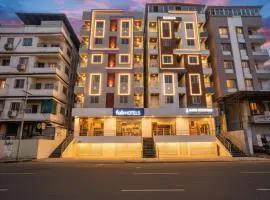 FabHotel Rising Surya - Nr Embassy Tech Zone