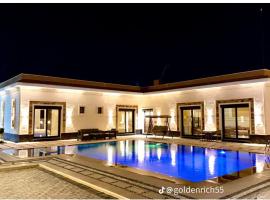 Reef Golden Resort شاليه الريف الذهبي, hotel en Qaryat ash Shamālī