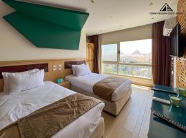 Grand museum & pyramids view inn, hotel em Banī Ghālib