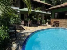 Pousada a duas quadras da Praia Grande de Ubatuba , litoral norte de S.P .