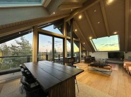 Naava Chalet 402 Penthouse - Kattohuoneisto järvinäköalalla, ξενοδοχείο σε Ähtäri