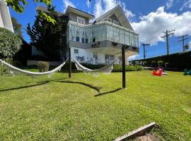 Vila de Charme Suítes,位于坎波斯杜若尔当的酒店