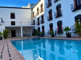 Hotel María del Carmen，哈爾潘的飯店