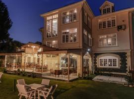 Heritage Bungaow, готель у місті Срінагар