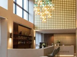 Hôtel des Innovations - Hôtel & Appartements - Votre séjour entre Fribourg, ville médiévale et La Gruyère et ses Bains