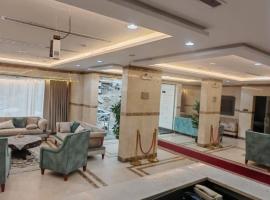فندق سحر السيمت, hotel en Al Khansāk