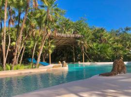 Kin Resort Lodge, hotel v destinaci Maya Beach