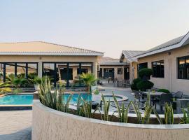 Executive Suites and Spa, hotel v mestu Letlhakawe