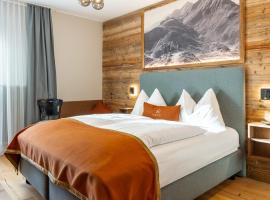 GRETI - Alpine Boutique Hotel mit Alpentherme Eintritt, reichhaltigem Frühstück, Sauna, Hotel in Bad Hofgastein