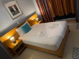 Spencer Residencial QUARTOS, hotel sa Praia