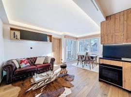 From green to slopes - Alpine ski and golf condo, hotel em Crans-Montana