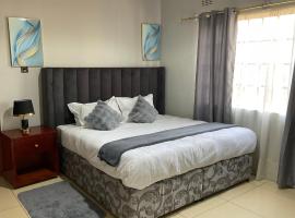 Golden Favour Homes، فندق في ليلونغوي