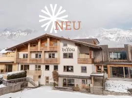 biYou Ecoquartier in den Bergen