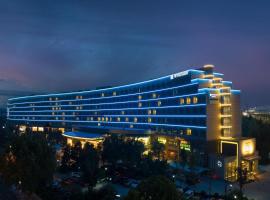 Wyndham Qingdao: Qingdao şehrinde bir otel