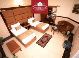 Orchid Inn by WIH, hotel en Karachi