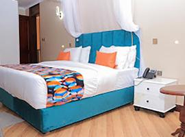 UPBEAT HOLIDAY HOTEL KIBAALE-Karuguuza, hotel di Kikangala
