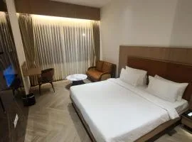 Get Inn - Rooms & Banquets, VIP Road, Vesu