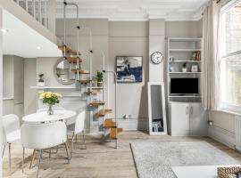 Well Appointed Garden Condo in Kensington Olympia, hotell i London