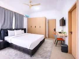 Deluxe Balcony Room in East Legon with Free Breakfast & Gym Access
