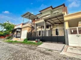 OYO 95170 Purnama Baru Syariah