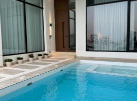 RETREAT Beach house شاليه ريتريت للعوائل, hotel u gradu An Nāmī