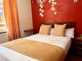Hostal Green Garden en el centro de Baños de Agua Santa