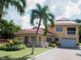 experience villa, hôtel à Buccoo