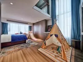 XiDaWu Family Apartments Hotel at ChangshaHigh-Speed Rail Station