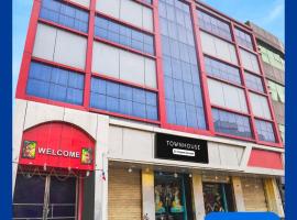 Super Townhouse Butler Road Near Maripur Chowk, hotel i Muzaffarpur