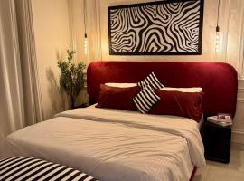 Celeste Suites - 1BR Self Checkin - Pool - Gulberg Lahore, viešbutis mieste Lahoras