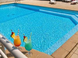 Appartement Charme Vanille 2 chambres piscine parking Gosier proche plage, hotel a Le Gosier