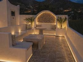 Papafotis Apartments & Suites، فندق في أليندا
