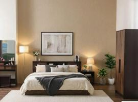 العز Alizz, hotell i Ādam