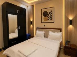 KIGALI E6 APARTMENT WITH SWIMMING POOL AND TOUR SERVICEs, hotel v destinaci Kigali