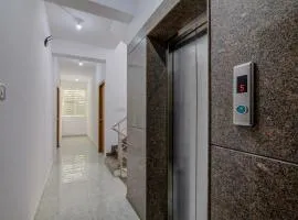 Hotel O Varcity Comforts Near St. John Medical College