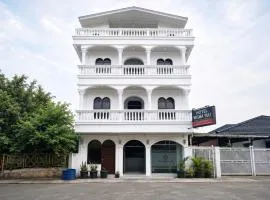 Hotel O near Masjid Raya Al-Mashun formerly Hotel Wisma Yuli
