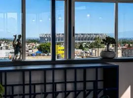 Suites a 3 Min del Estadio - Terraza - Servicios Exclusivos