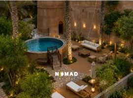 Nomad Inn Al Bustan