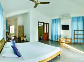 รูปภาพของโรงแรม: 3 Bedroom Bungalow in Anjuna, Goa