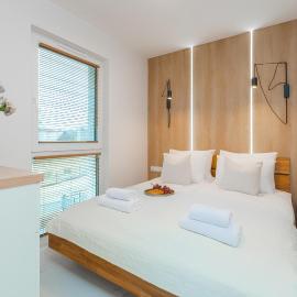 Flatbook Rodzinne Apartamenty Jantar Resort z Parkingiem, Placem Zabaw i Wiatą Grillową, hotel en Jantar