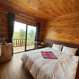 Trần Gia Homestay, отель в городе Văn Chấn