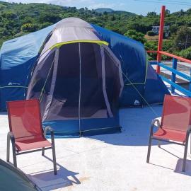 Rooster Run Camping is a - rooftop & elevated camping experience! Incredible views of The Rain Forrest and Culebra across the Atlantic Ocean - Tents, towels, comfortable Air Beds, Warm Shower-Central Location- 5 beaches -25 min walk & Ferry is 20 min, hotel Viequesben