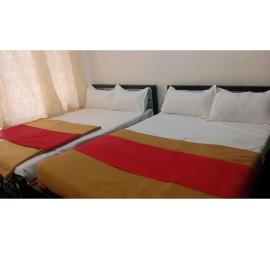 Hotel Guest Inn, hotel di Mysore