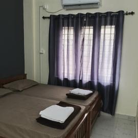 TGM Inn، فندق في كوتايم