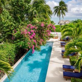 Weezie's Ocean Front Hotel and Garden Cottages, hotel Caye Caulkerben