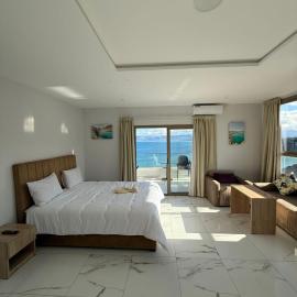 Golden Bay Hotel, отель в Эль-Хосейме
