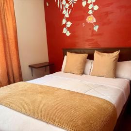 Hostal Green Garden en el centro de Baños de Agua Santa